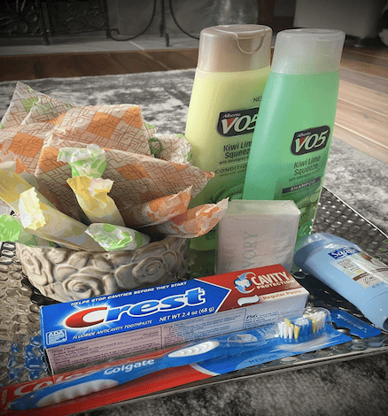 foundation-impact (1) Various toiletries gathered on a carpet